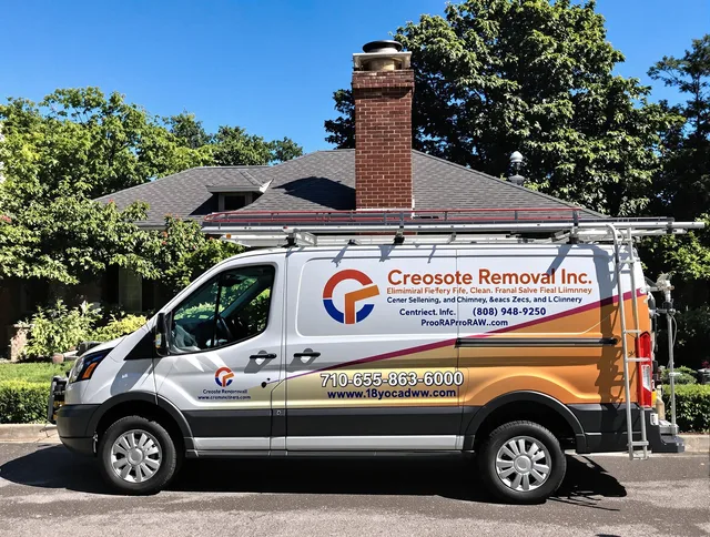 Winchester Chimney Sweep technician removing creosote safely in Winchester, MA