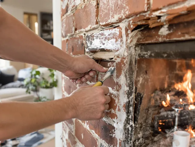 Routine fireplace repair by Winchester Chimney Sweep in Winchester, MA
